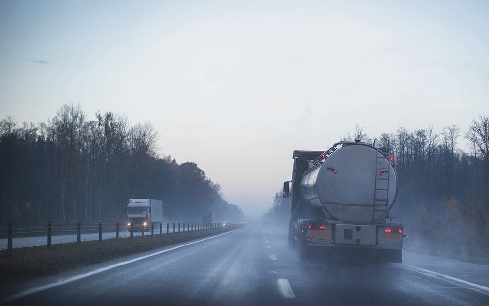 How Much Slower Should Trucks Travel in Poor Conditions?